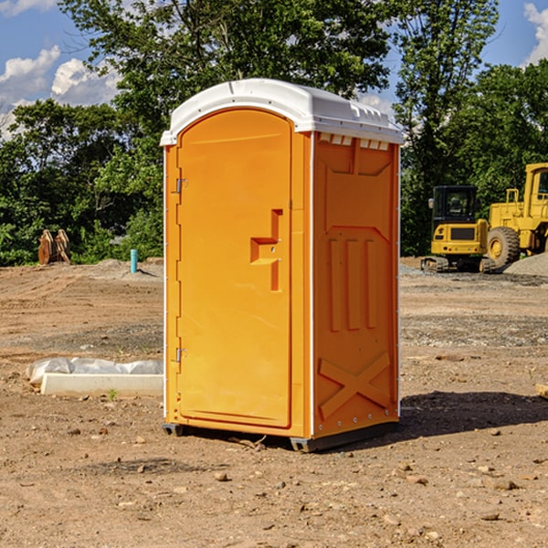 what is the cost difference between standard and deluxe portable restroom rentals in Webb IA